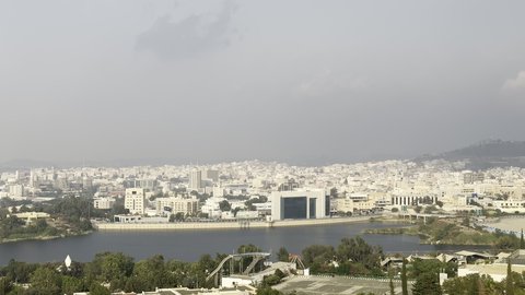 Abha mountain ranges, rugged terrain and stone roads, aerial photography of the mountainous environment in the Asir region, green nature, beautiful parks and gardens, trees and plants on the mountain slopes