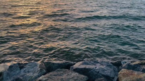 The concept of recreation and enjoyment in the summer atmosphere in the sea of Jeddah and South Obhur, the movement of calm sea waves, coastal tourist sites in the Kingdom of Saudi Arabia, attracting and attracting tourists from all over the world.