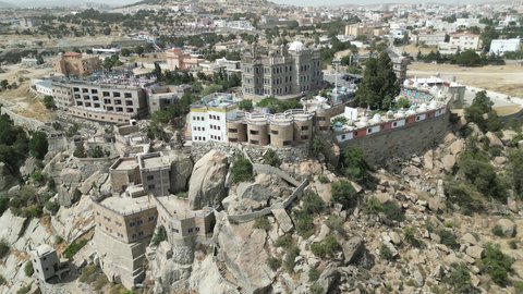 Qasr Al-Maqar for Civilizations in Namas, areas that attract tourists from all over the world, popular heritage villages, famous tourist places and landmarks during the day, mountains and natural heights in the Kingdom of Saudi Arabia