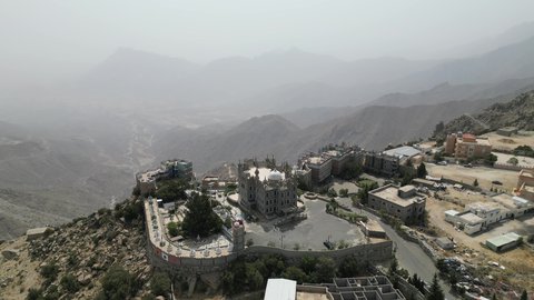 Popular heritage villages, areas that attract tourists from all over the world, Al-Maqar Palace for Civilizations in Namas, famous tourist places and landmarks during the day, mountains and natural heights in the Kingdom of Saudi Arabia