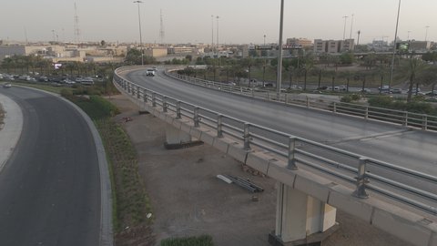 Intersecting roads in Saudi Arabia, traffic on the highway in Damascus Square in Riyadh, advanced infrastructure, attention to streets and greenery