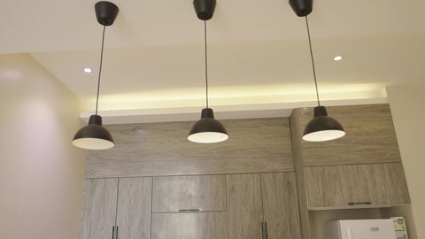 A luxurious kitchen in beige, interior designs for villas and residential apartments, glass windows and facades, modern decorations for luxurious Arabic kitchens in the Sultanate of Oman.