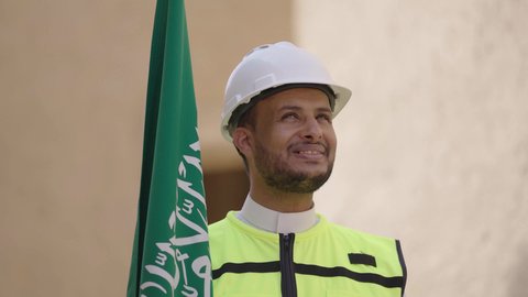 Construction basics for heritage houses and palaces, the day we started in 1727 AD, National Day September 23, learning about ancient architecture, the anniversary of the founding of the first Saudi state February 22, a Saudi Gulf Arab engineer wearing a jacket and helmet carrying the national emblem to celebrate Flag Day March 11, a tour of the popular district