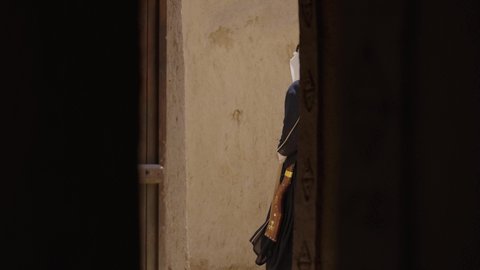 Using weapons to protect the kingdom's property, a Saudi Arabian Gulf man wearing traditional folk costume holding a rifle, the day we began 1727 AD, the anniversary of the founding of the first Saudi state, February 22, preparing and getting ready to defend and protect the homeland