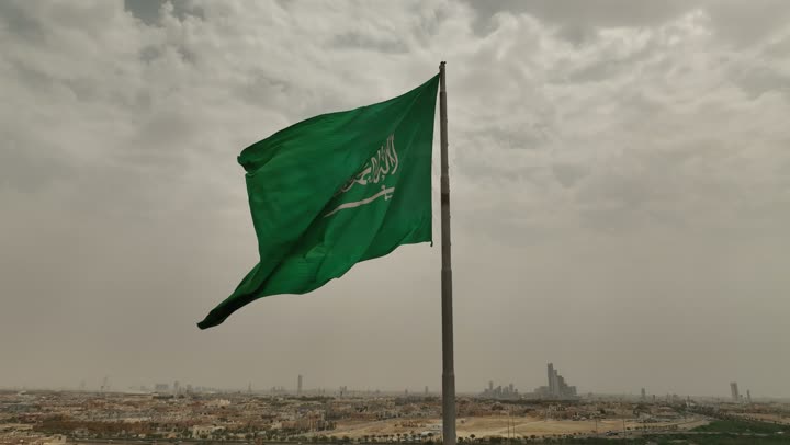 National occasions, holidays and celebrations, Saudi Flag Day, March 11, aerial drone photography of the Saudi flag in Riyadh, Saudi National Day, September 23, the concept of patriotism and belonging to one's homeland