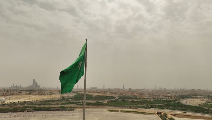 National occasions, holidays and celebrations, Saudi Flag Day, March 11, aerial drone photography of the Saudi flag in Riyadh, Saudi National Day, September 23, the concept of patriotism and belonging to one's homeland