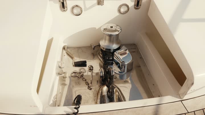 Sailing in the harbor and yacht marina in Dubai Marina, the architectural art of the buildings and structures overlooking the sea, the urban growth of towers and skyscrapers in the United Arab Emirates, famous tourist attractions in Dubai, the waterfront overlooking the Arabian Gulf coast