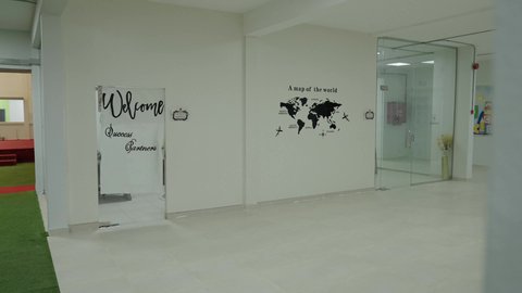 An organized educational environment, an interior corridor in one of the modern schools in the Kingdom of Saudi Arabia, contemporary interior design, school boards with modern designs.