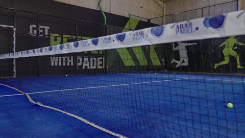 Enjoying favorite hobbies, a spacious playground in one of the modern schools in the Kingdom of Saudi Arabia, practicing sports activities and football, green grass surface, focusing on health and fitness.