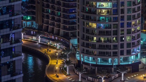 Dubai Marina Marina and Marina, the architectural art of buildings and structures overlooking the sea, the growth and urban development of towers and skyscrapers in the United Arab Emirates, famous tourist attractions in Dubai, the waterfront overlooking the Arabian Gulf coast