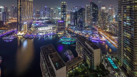 Dubai Marina Marina and Marina, the architectural art of buildings and structures overlooking the sea, the growth and urban development of towers and skyscrapers in the United Arab Emirates, famous tourist attractions in Dubai, the waterfront overlooking the Arabian Gulf coast