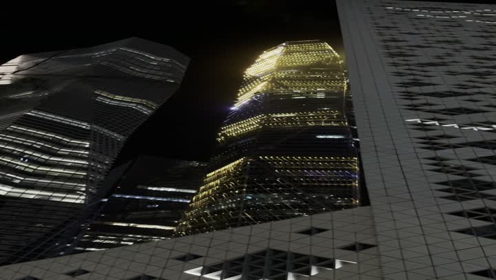 الأبراج وناطحات السحاب على الطراز الحديث والمتطور,التطور المستمر في قطاع الإنشاءات والهندسة المعمارية داخل المدينة، تصوير درون جوي لأفق مدينة الرياض وقت الليل معالم التجارة والاقتصاد المشهورة في العاصمة السعودية، مركز الملك عبد الله المالي (كافد)