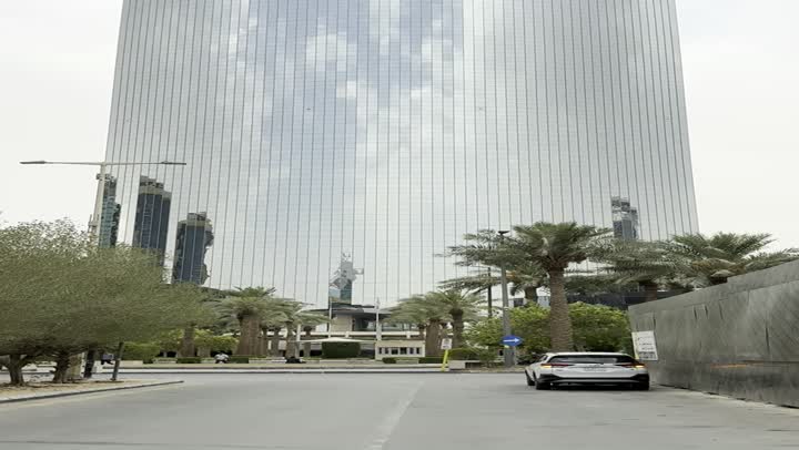 Top-down view of the famous Kingdom Tower in Riyadh, towers and skyscrapers, growth, development and urban progress, famous buildings and landmarks in Saudi Arabia, modern and advanced architectural art,