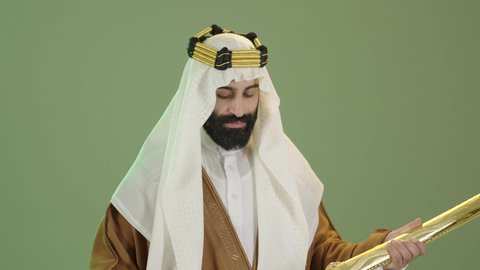 The day we began 1727 AD, the anniversary of the founding of the first Saudi state on February 22, the Saudi National Day commemoration on September 23, a portrait of a Saudi Arabian Gulf man wearing a bisht, ghutra and agal on the founding day, holding a sword in his hand