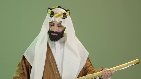 ذكرى تأسيس الدولة السعودية الأولى في 22 فبراير، تذكار اليوم الوطني السعودي 23 سبتمبر، بورتريه لرجل عربي سعودي خليجي يرتدي البشت والغتره وعقال يوم التأسيس يحمل بيده سيف  ، يوم بدينا 1727م