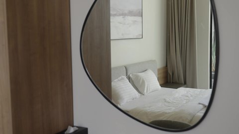 A bedroom with luxurious home furnishings, the interior design of a modern relaxation room in a luxury chalet, furnishing the suite with all the high-end furnishings, and elegant interior decoration for villas and residential apartments in the Kingdom of Saudi Arabia.