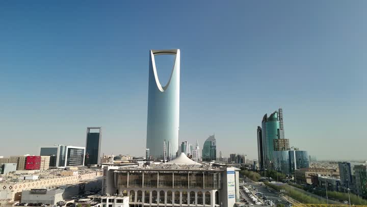 Famous tourist attraction, towers and skyscrapers, growth and development, urban progress, lifestyle in the capital, famous buildings and commercial landmarks in Saudi Arabia, advanced and modern architectural art, aerial photography of the famous Kingdom Tower in Riyadh