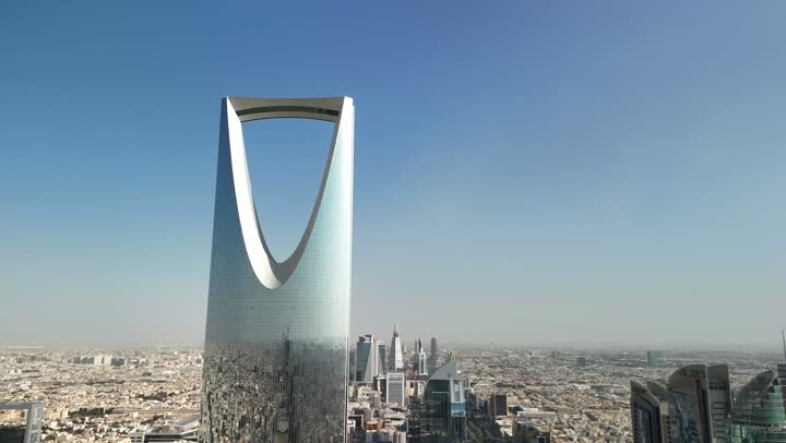 Famous tourist attraction, towers and skyscrapers, growth and development, urban progress, lifestyle in the capital, famous buildings and commercial landmarks in Saudi Arabia, advanced and modern architectural art, aerial photography of the famous Kingdom Tower in Riyadh