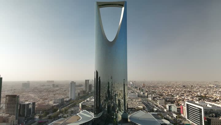 Lifestyle in the capital, famous buildings and landmarks in Saudi Arabia, modern and advanced architectural art, aerial photography of the famous Kingdom Tower in Riyadh, towers and skyscrapers, growth, development and urban progress