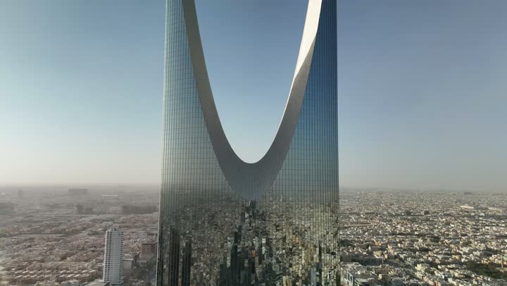 Lifestyle in the capital, famous buildings and landmarks in Saudi Arabia, modern and advanced architectural art, aerial photography of the famous Kingdom Tower in Riyadh, towers and skyscrapers, growth, development and urban progress