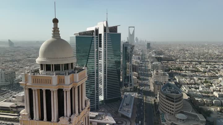 Attracting tourists from all over the world, the architectural art of commercial establishments in the capital during the day, an aerial drone shot of the Narcissus Hotel in Riyadh, Saudi Arabia, the urban growth and progress of towers and skyscrapers, a famous tourist attraction