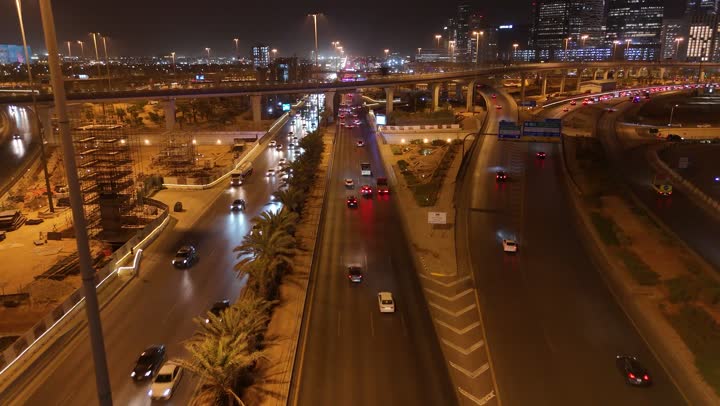 The architectural art of modern commercial and residential buildings and facilities, the traffic in the capital's illuminated streets at night, the interest in infrastructure in the city of Riyadh, the towers and skyscrapers in the Kingdom of Saudi Arabia, urban growth and progress.