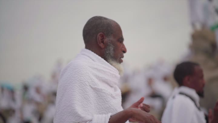 Performing the rituals of Hajj on the Day of Arafah, a destination for Muslims from around the world, a sacred Islamic religious site in the Kingdom of Saudi Arabia, crowds of pilgrims on Mount Arafat, the concept of worship and drawing closer to God, pilgrims and Umrah performers in Mecca.