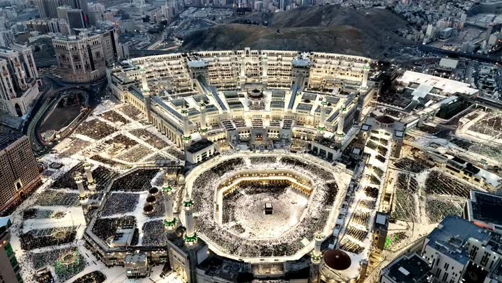 Aerial view Mecca Ramadan 1446, Makkah city Clock Tower, Masjid Al Haram Al Kaaba 4k drone Video