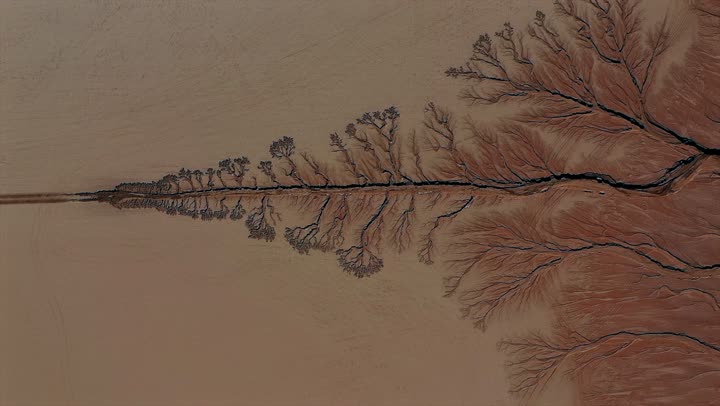 A distinctive landscape of rain, rainy winter weather, wildlife reserves in the Kingdom of Saudi Arabia, King Salman bin Abdulaziz Royal Reserve, natural geographical diversity, rugged mountains and rock formations, rare historical monuments,