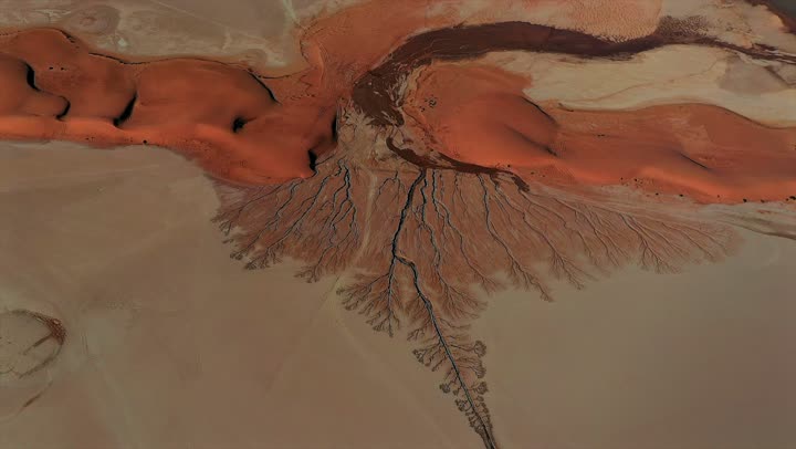 A distinctive landscape of rain, rainy winter weather, wildlife reserves in the Kingdom of Saudi Arabia, King Salman bin Abdulaziz Royal Reserve, natural geographical diversity, rugged mountains and rock formations, rare historical monuments,