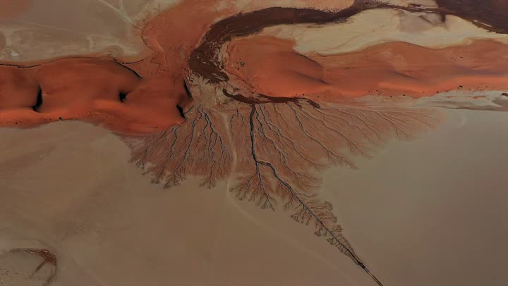 Rainy winter weather, wildlife reserves in the Kingdom of Saudi Arabia, King Salman bin Abdulaziz Royal Reserve, natural geographical diversity, rugged mountains and rock formations, rare historical monuments, and a distinctive natural view of rainfall.