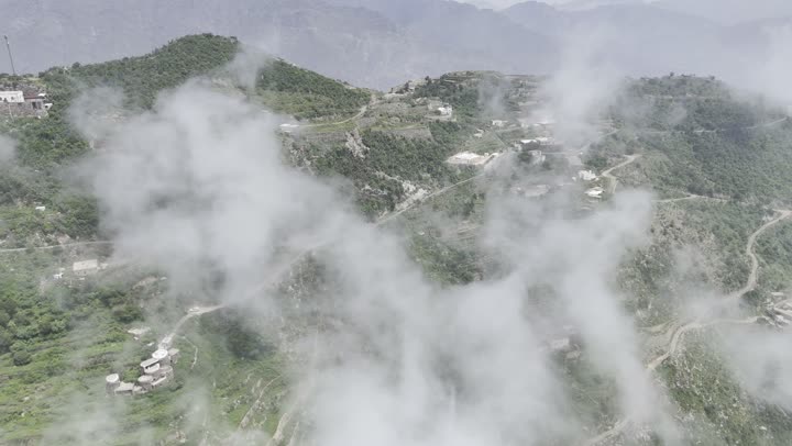 The towering mountains in southern Saudi Arabia, wide aerial photography of the Talan Mountains in Jazan, the diversity of terrain and the beauty of nature.