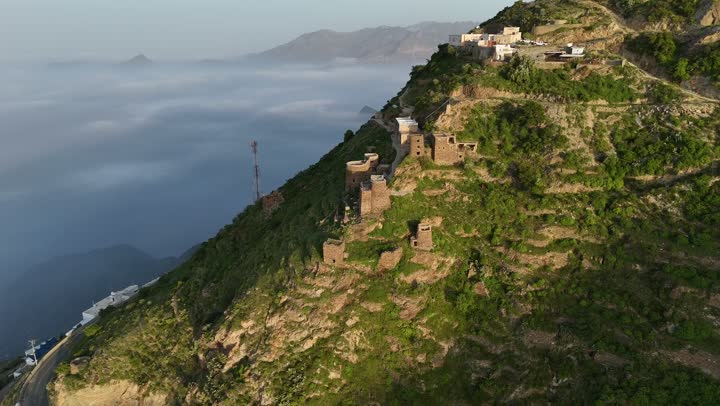 The peaks and mountain heights in Saudi Arabia, a panoramic drone view of the Tolan Mountains in Jazan reveals the grandeur of the peaks and the tranquility of nature.