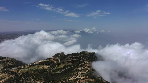 Foggy, cloudy skies in highlands, famous natural landmarks, topography of mountain peaks and heights, aerial drone footage of Tanuma Mountains in Saudi Arabia