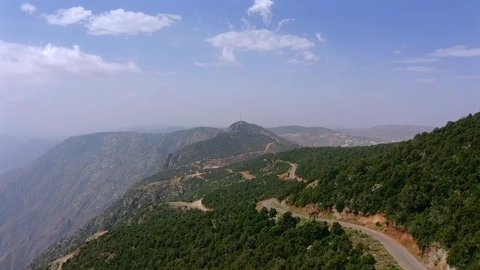 Agricultural terraces and green plants on mountain ranges and heights, Balsamar Governorate in Asir region, a distinctive natural landscape, rock formations and composition in the Kingdom of Saudi Arabia