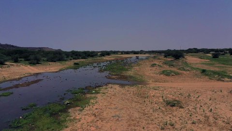 Bird migration season, natural tourist attractions in the Kingdom of Saudi Arabia, places that attract tourists from all over the world, drone photography of Wadi Hali in the west of the Kingdom, migratory birds over the lake