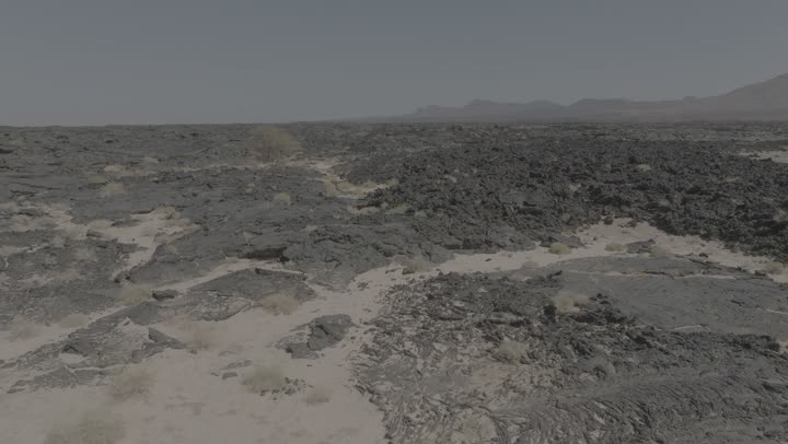 Landmarks of Medina, the mountains and volcanic craters in the Khaybar Lava Field, natural volcanic fields, a destination for tourists and earth scientists, natural places in the Kingdom of Saudi Arabia.