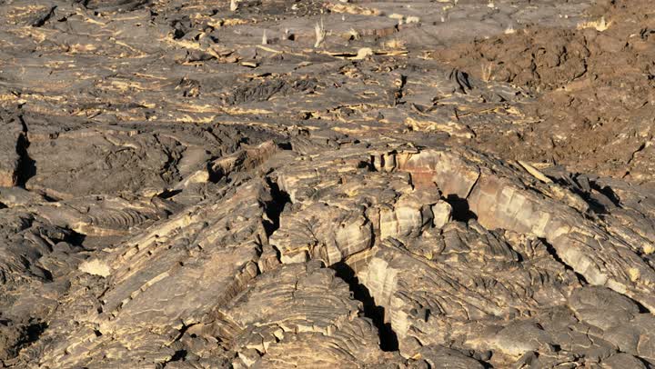 Landmarks of Medina, the mountains and volcanic craters in the Khaybar Lava Field, natural volcanic fields, a destination for tourists and earth scientists, natural places in the Kingdom of Saudi Arabia.
