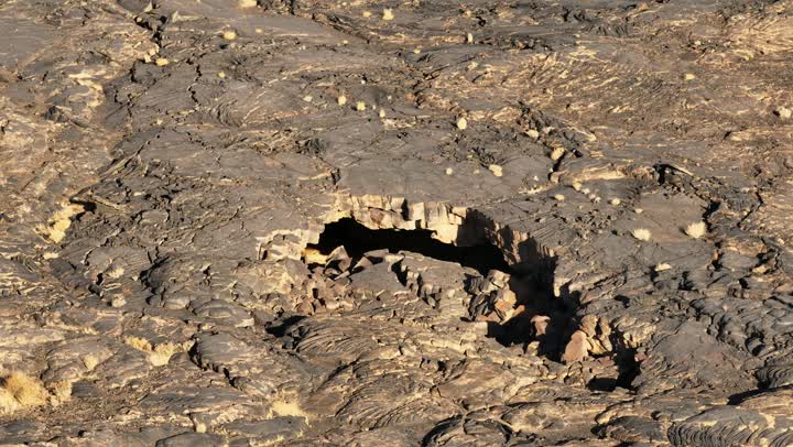 Natural volcanic fields, a destination for tourists and geologists, the mountains and volcanic craters in the Khaybar lava field, landmarks of Medina, natural places in the Kingdom of Saudi Arabia.