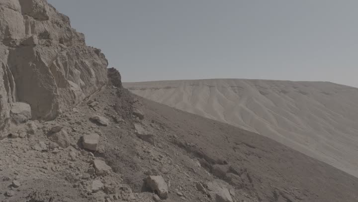 The mountains and volcanic craters in the Khaybar Lava Field, the landmarks of Medina, the natural volcanic fields, a destination for tourists and earth scientists, natural places in the Kingdom of Saudi Arabia.