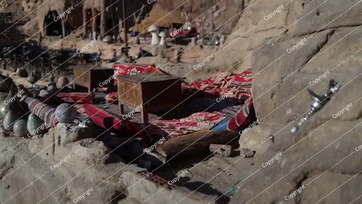 Bedouin desert lounge colorful carpets rustic low tables traditional setting han