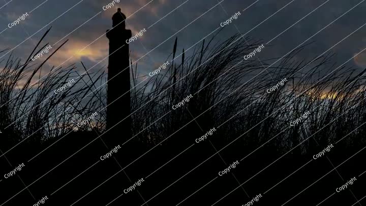 Silhouette Lighthouse and Grass in Landscape