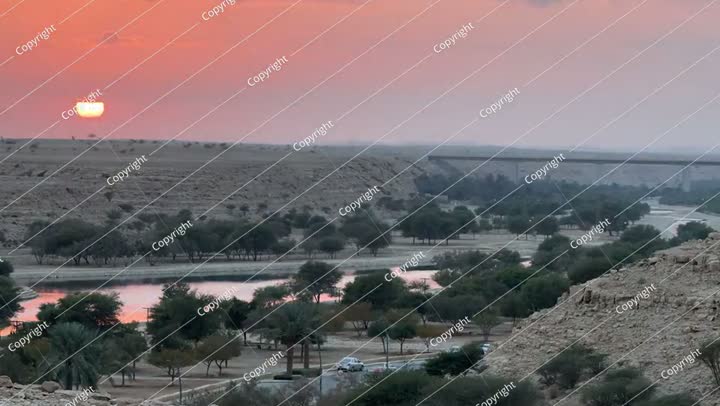 River in desert region in Middle East at sunset