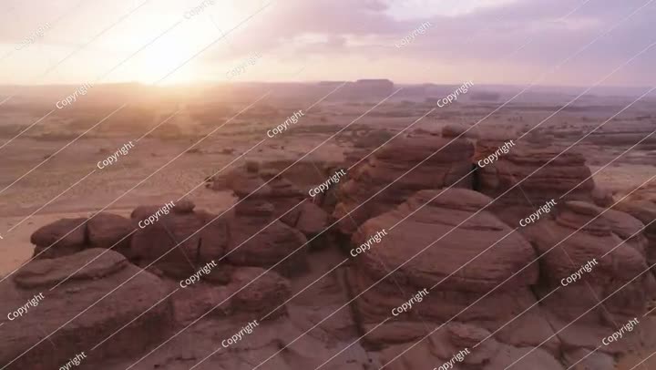 Gorgeous sunrise, rocky canyon, sun flares. Aerial 4K, sunrise.