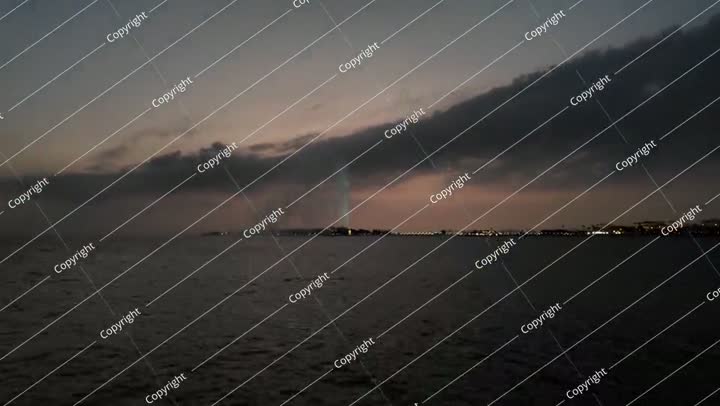 King Fahd's Fountain spraying water in Jeddah Waterfront at sunset