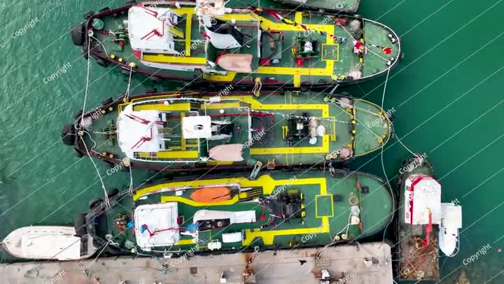 Ship tractor in the port Aerial view 4 K