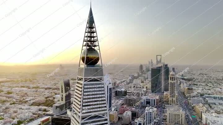 Al Faisaliah Tower pyramid-shaped commercial skyscraper. Riyadh. Drone shot