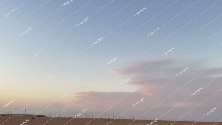 Photographing the desert of Kuwait with the clouds in the sky