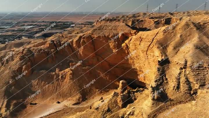 Aerial Shot Of Famous Natural Cave Against Clear Sky, Drone Descending Forward