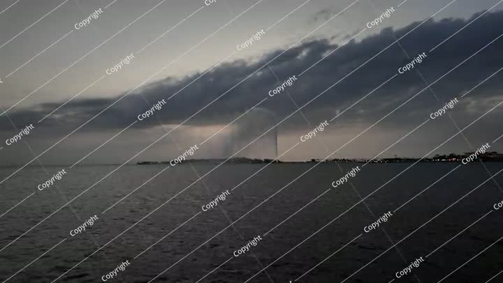 King Fahd's Fountain spraying water in Jeddah Waterfront at sunset